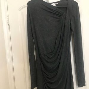 Long sleeves. Light stretchy material